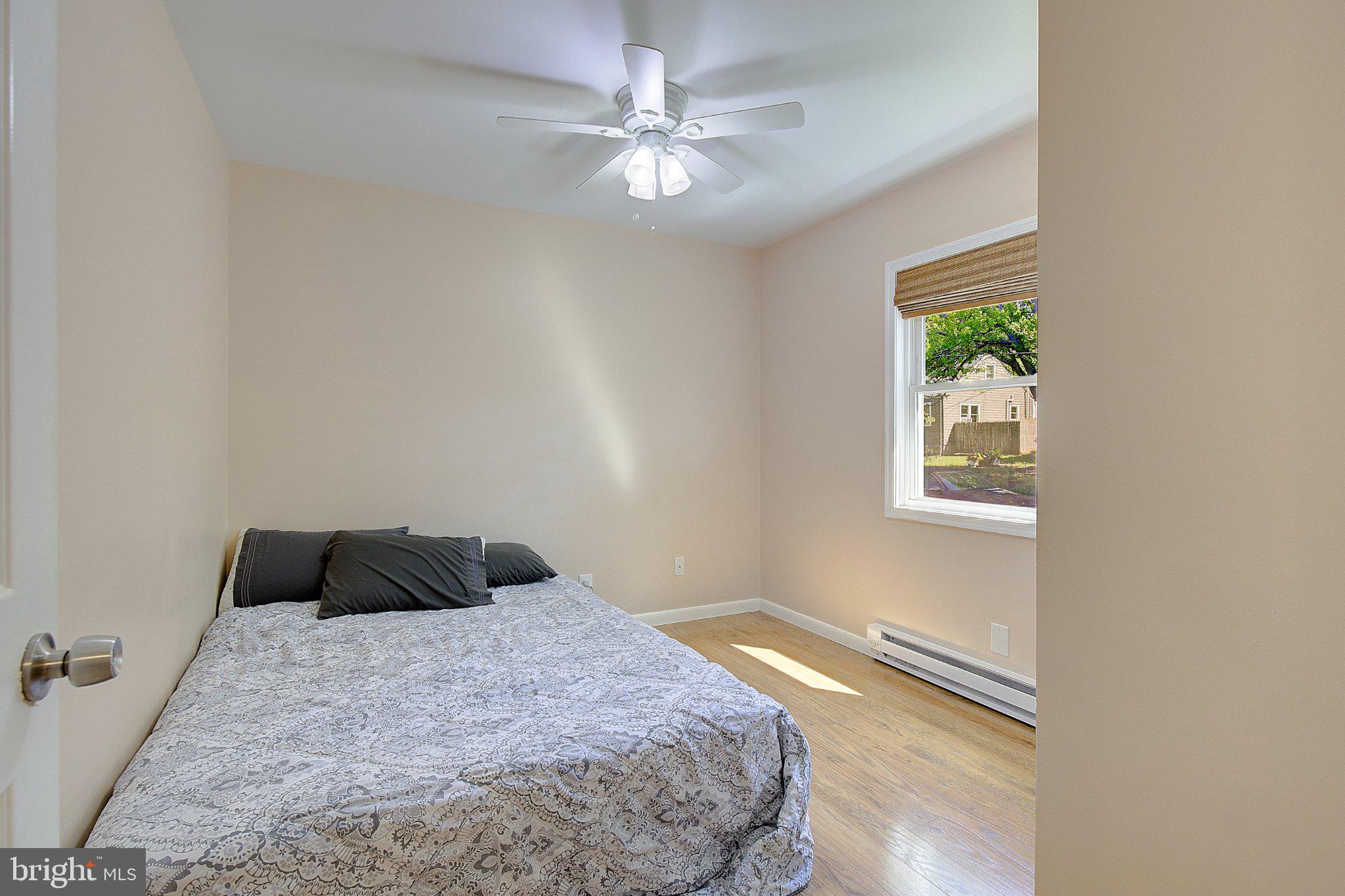 1718 Ridgely Road Edgewater, MD 21037 - Photo 8 of 19 Bright and airy bedroom retreat.