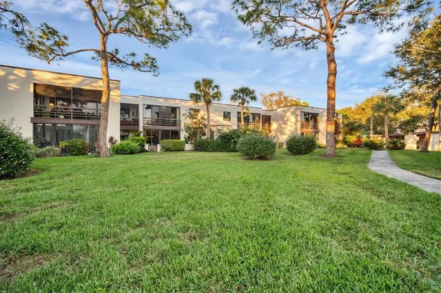 a view of a building with a big yard