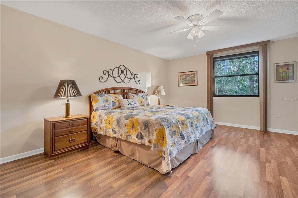 5032 Marsh Field Road, Unit 19 Sarasota, FL 34235 - Photo 12 of 30 a bedroom with a bed and a window