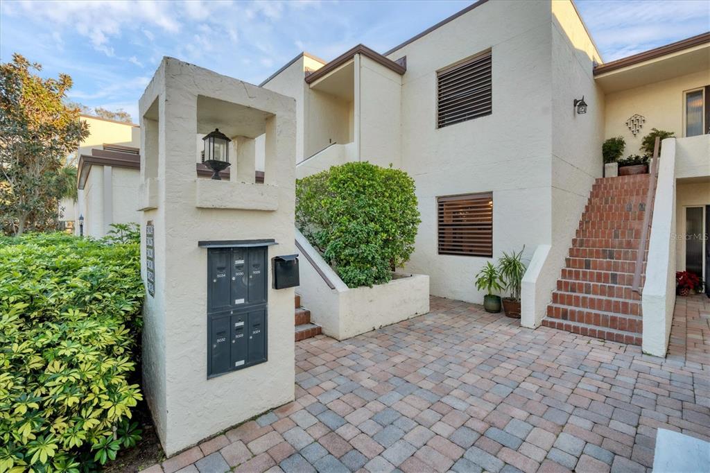 5032 Marsh Field Road, Unit 19 Sarasota, FL 34235 - Photo 2 of 30 a front view of a house with a yard