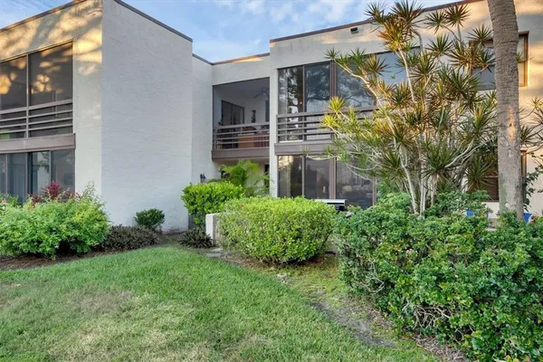 a view of a house with a garden
