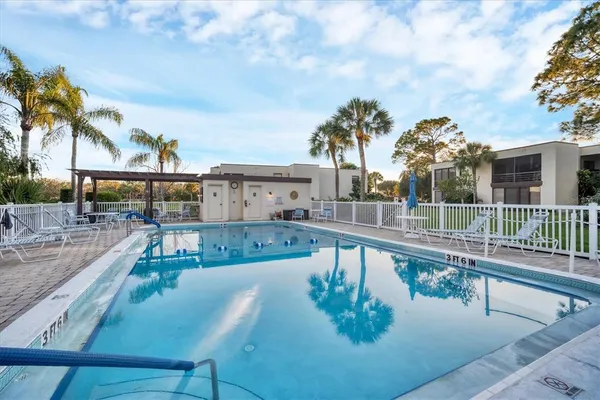 a view of a house with a swimming pool