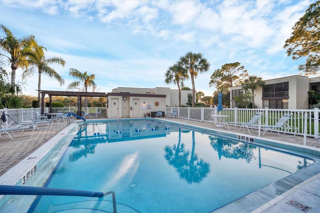 5032 Marsh Field Road, Unit 19 Sarasota, FL 34235 - Photo 29 of 30 a view of a house with a swimming pool