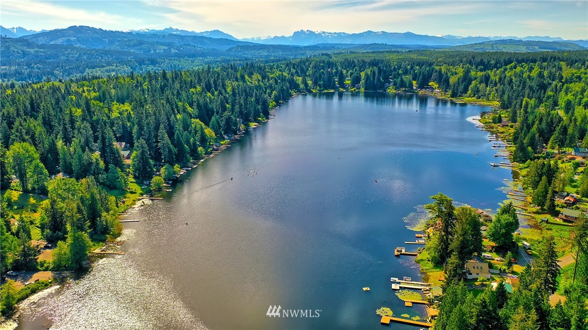 18812 Lerch Road Snohomish, WA 98290 - Photo 1 of 35 a view of a lake with a mountain view