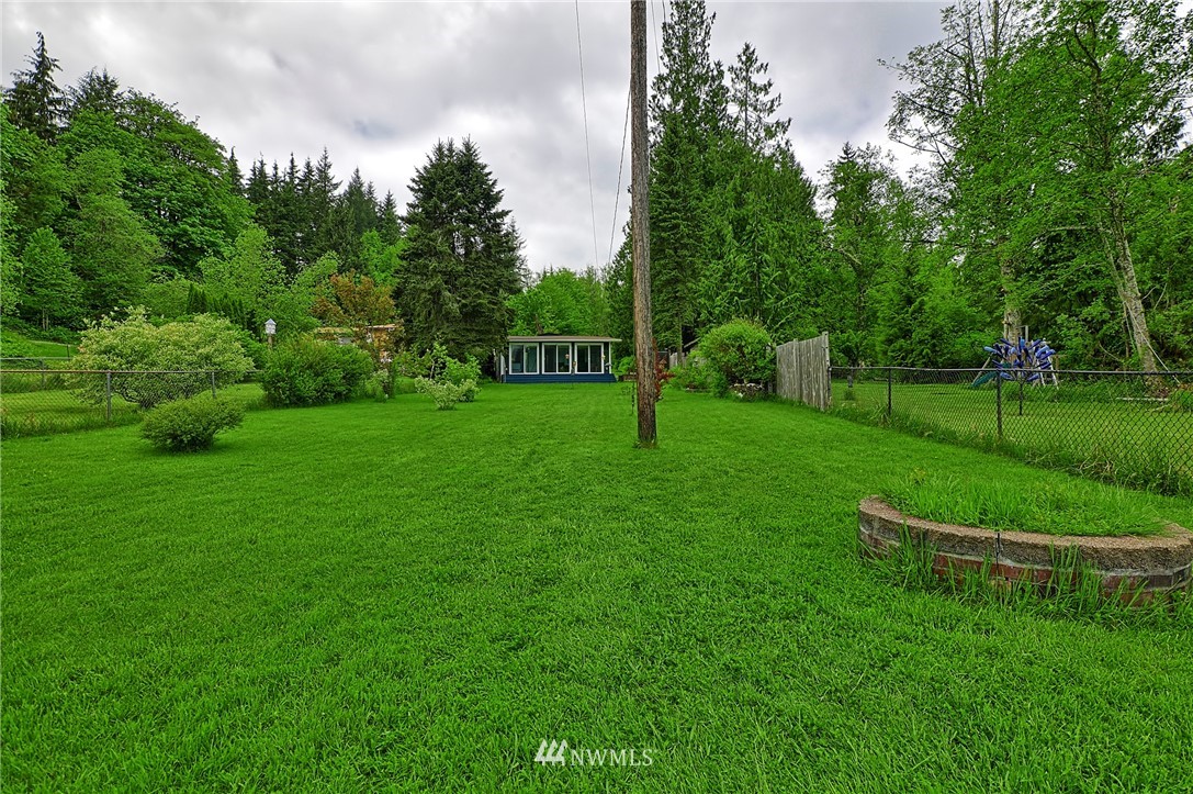 18812 Lerch Road Snohomish, WA 98290 - Photo 13 of 35 a view of a park with trees houses in back