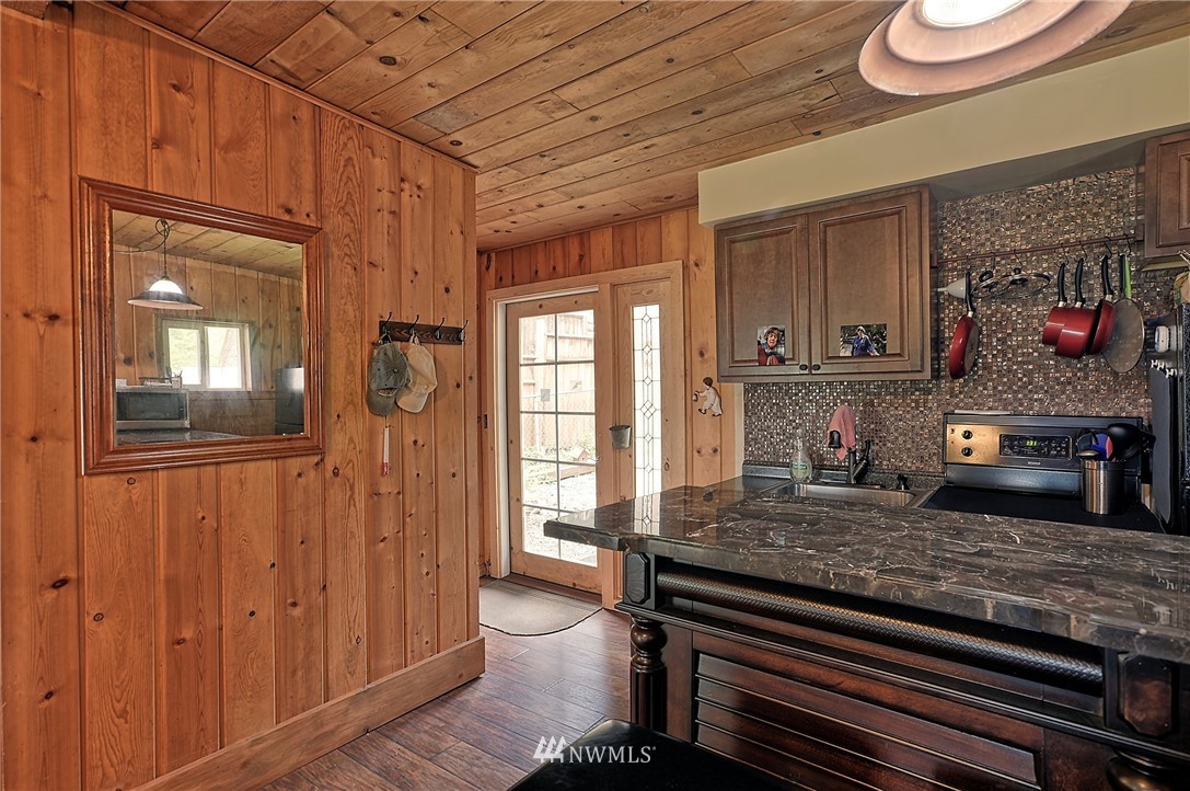 18812 Lerch Road Snohomish, WA 98290 - Photo 23 of 35 a living room with furniture and a fireplace