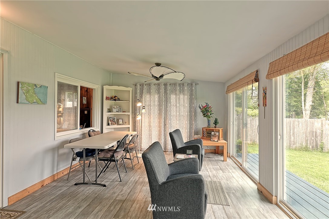 18812 Lerch Road Snohomish, WA 98290 - Photo 26 of 35 a living room with furniture and wooden floor