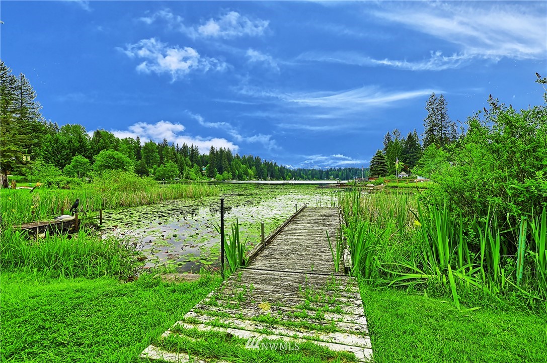 18812 Lerch Road Snohomish, WA 98290 - Photo 10 of 35 a view of a lake with a big yard