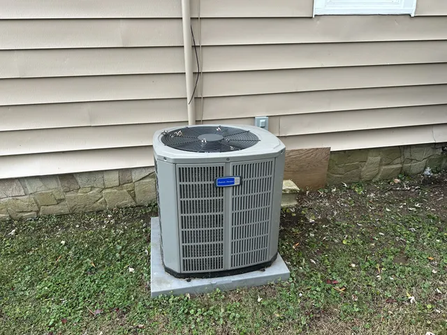 a view of house with backyard space and balcony