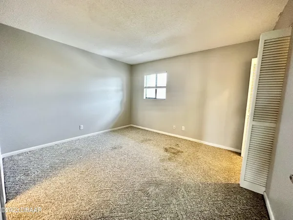 an empty room with a natural light