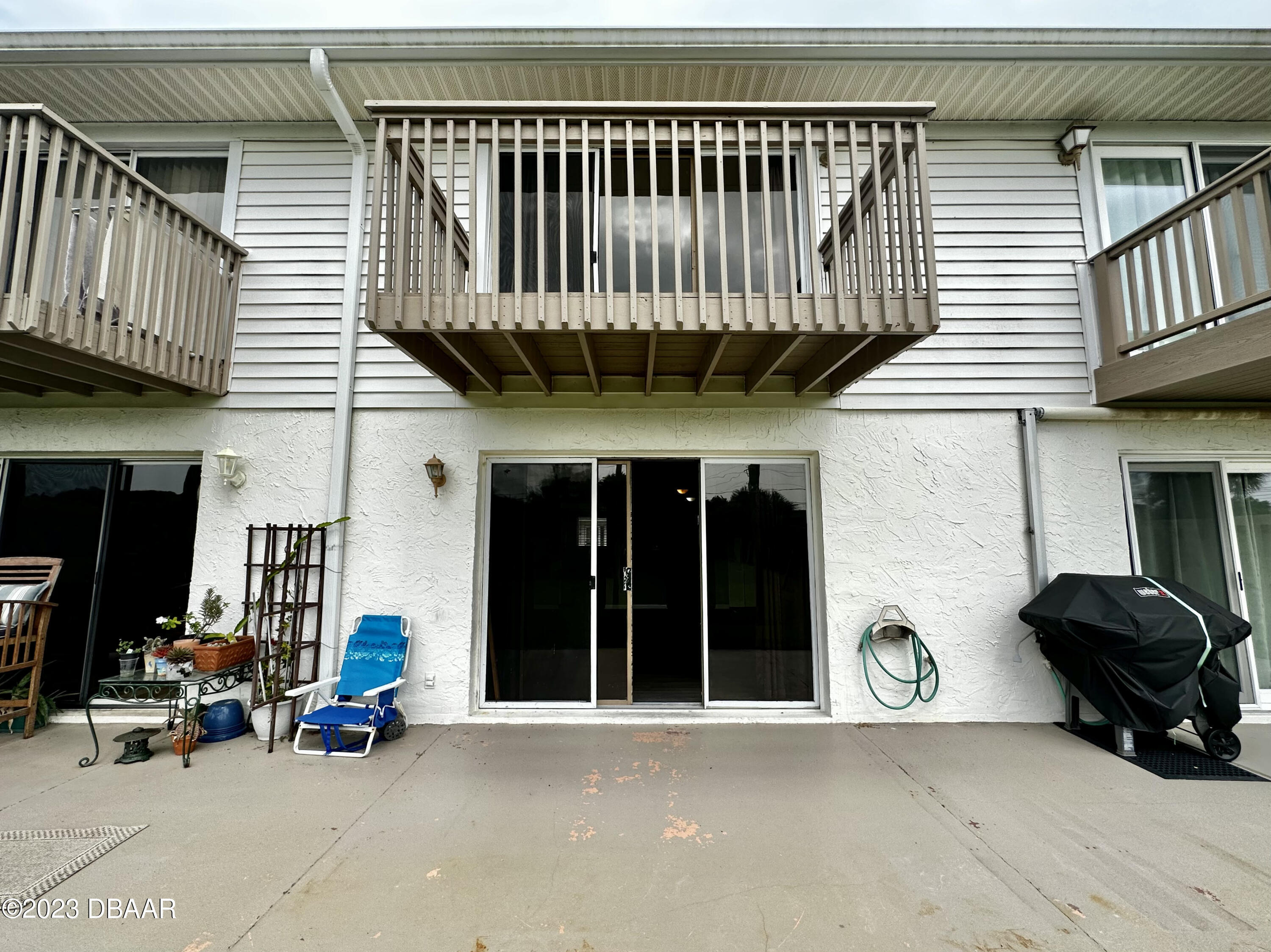 4790 South Atlantic Avenue, Unit D403 Ponce Inlet, FL 32127 - Photo 25 of 27 a view of a car park in front of house