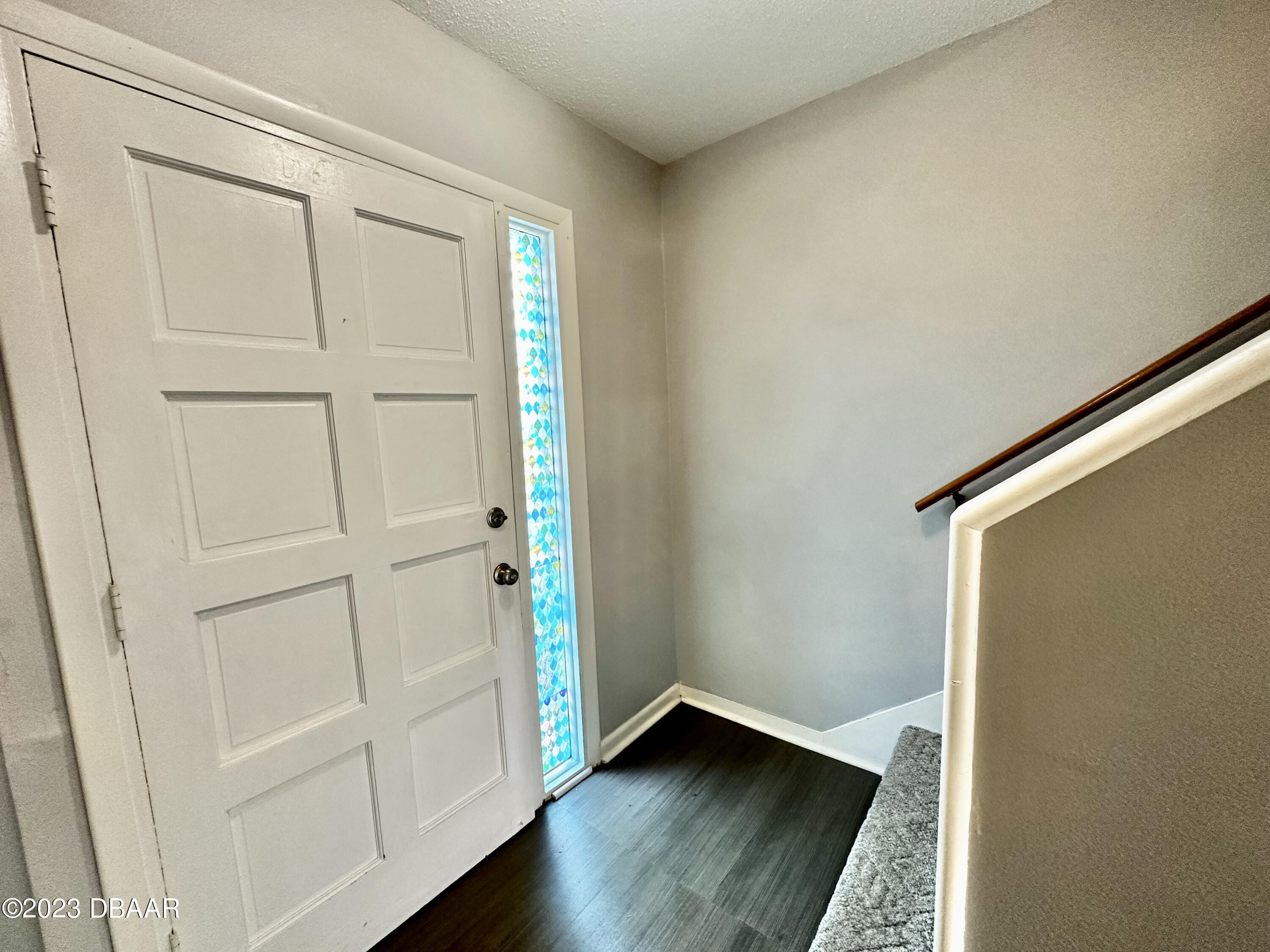 4790 South Atlantic Avenue, Unit D403 Ponce Inlet, FL 32127 - Photo 26 of 27 an empty room with wooden floor and closet