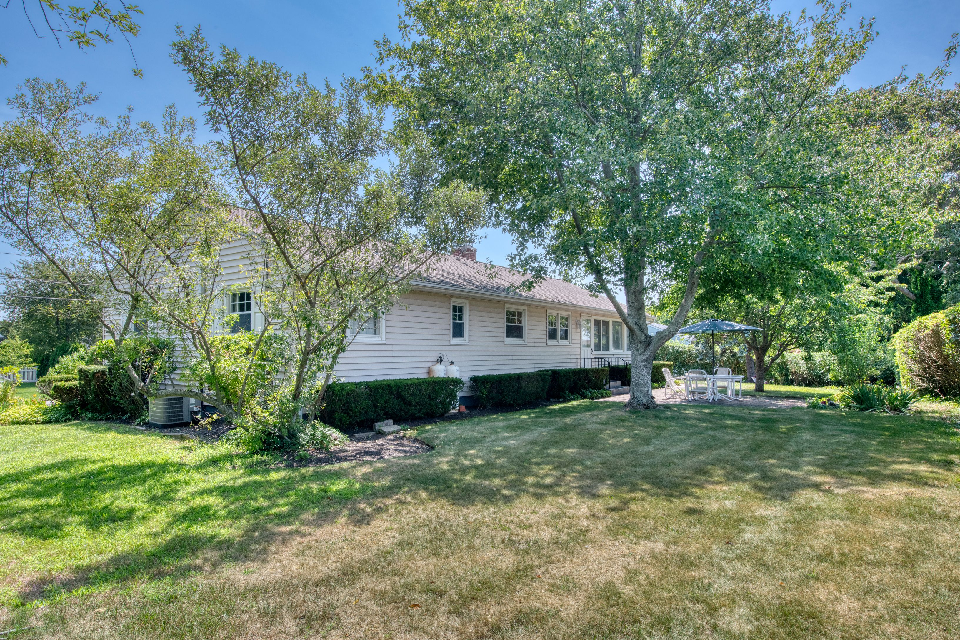 35 Ridge Drive Sag Harbor, NY 11963 - Photo 12 of 14 a view of a house with a yard