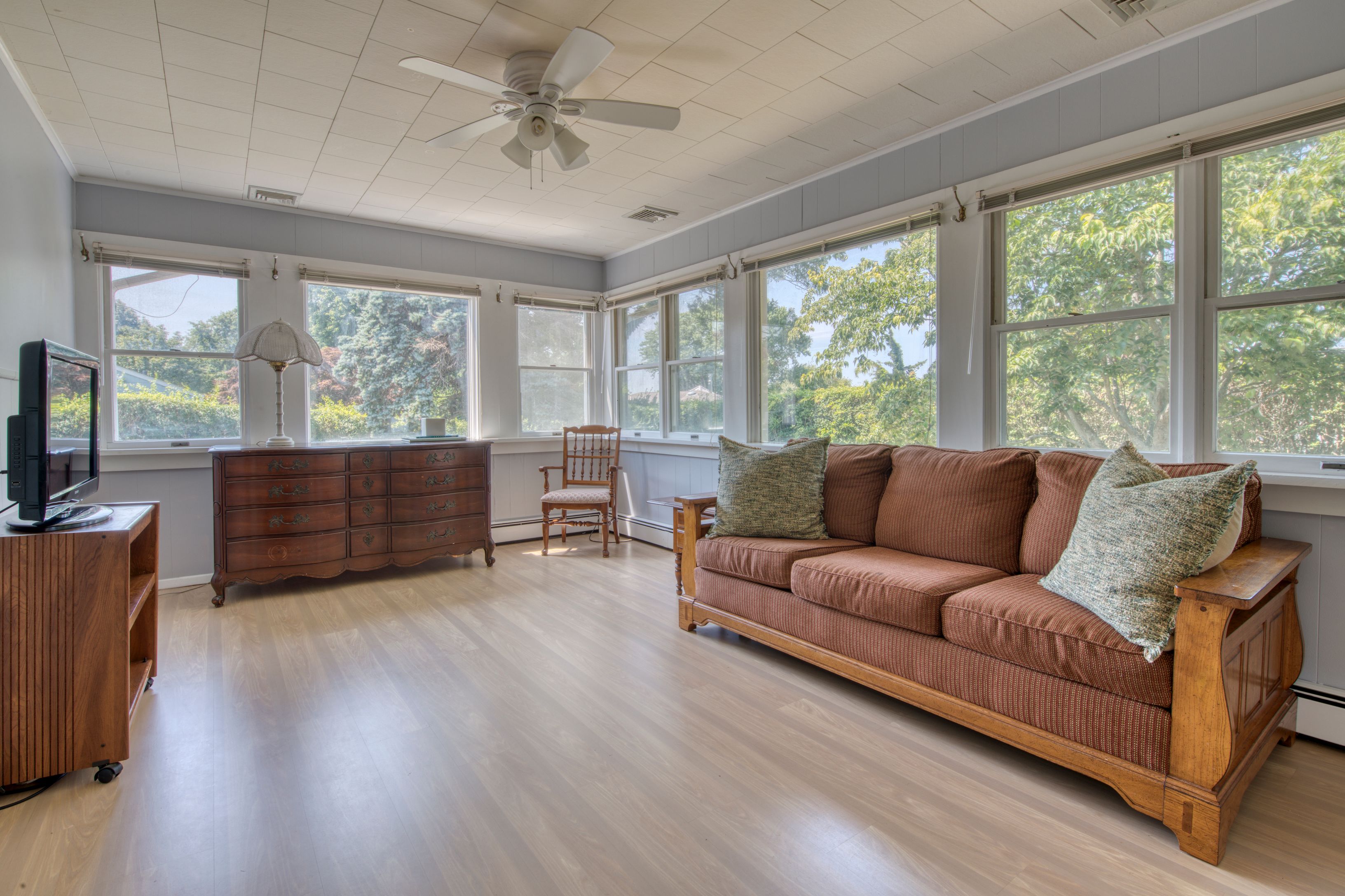 35 Ridge Drive Sag Harbor, NY 11963 - Photo 6 of 14 a living room with furniture and a large window