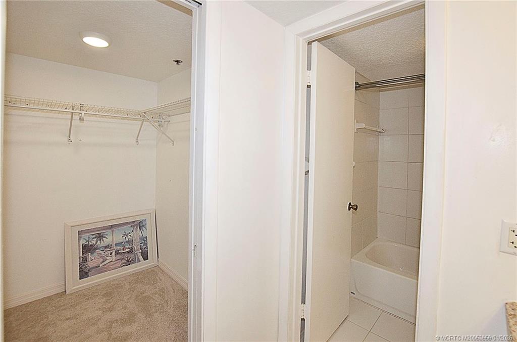 950 South Kanner Highway, Unit 9 Stuart, FL 34994 - Photo 12 of 22 a bathroom with a shower and a glass door