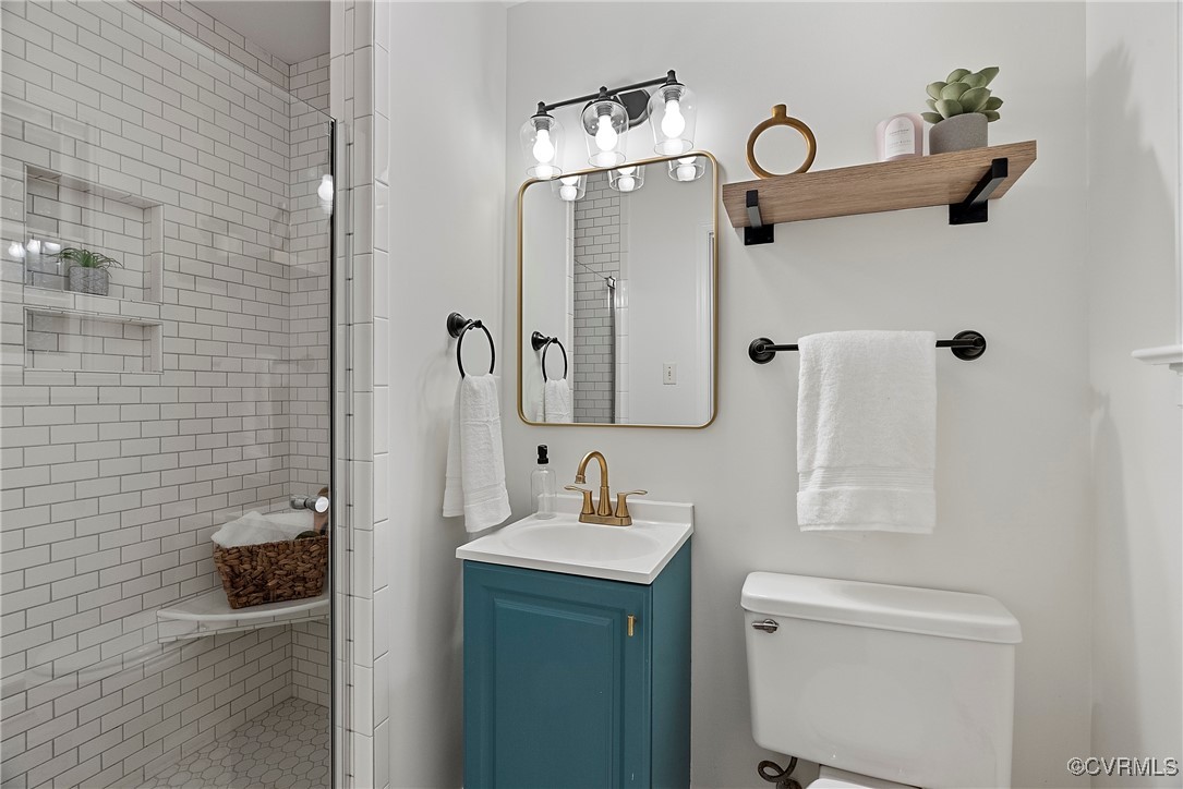 2502 Brookwood Road North Chesterfield, VA 23235 - Photo 22 of 32 a bathroom with a sink a toilet and shower