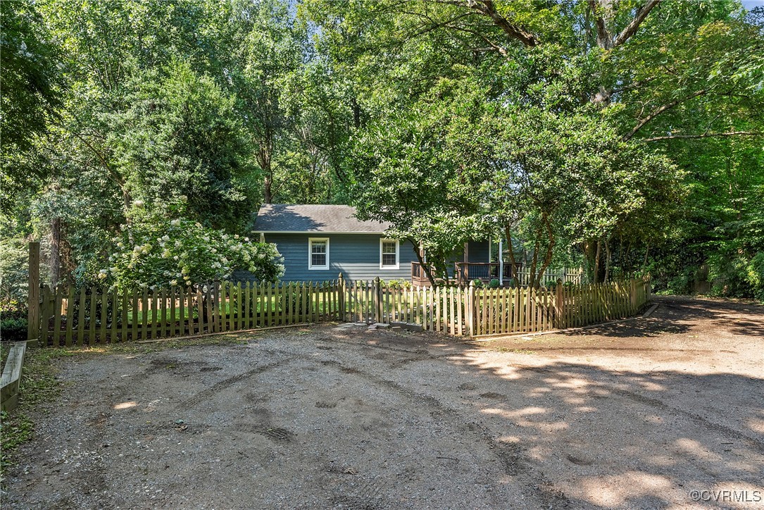 2502 Brookwood Road North Chesterfield, VA 23235 - Photo 32 of 32 a view of a house with a yard