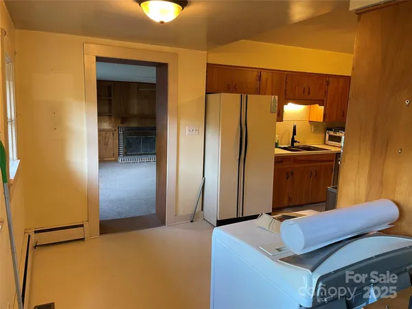 a bedroom with a bed and furniture