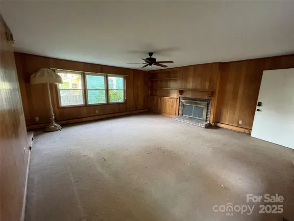 an empty room with windows