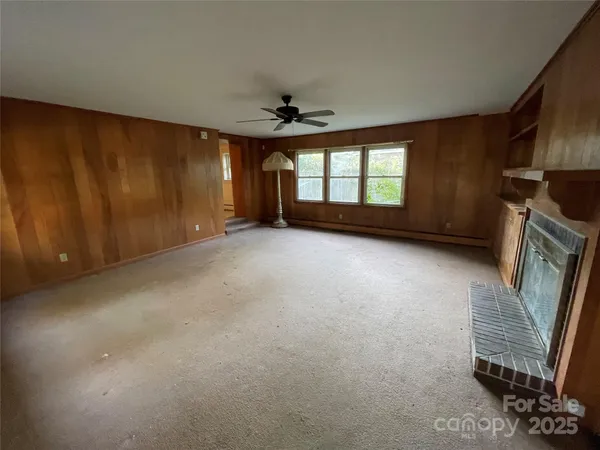 an empty room with windows