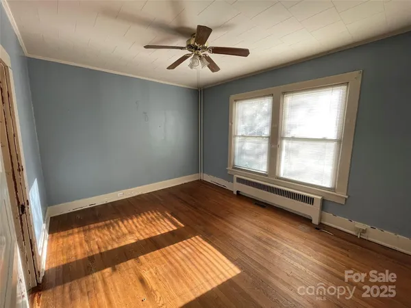 a view of an empty room and window