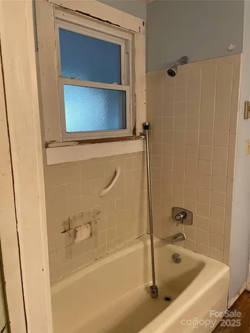 a bathroom with a bathtub