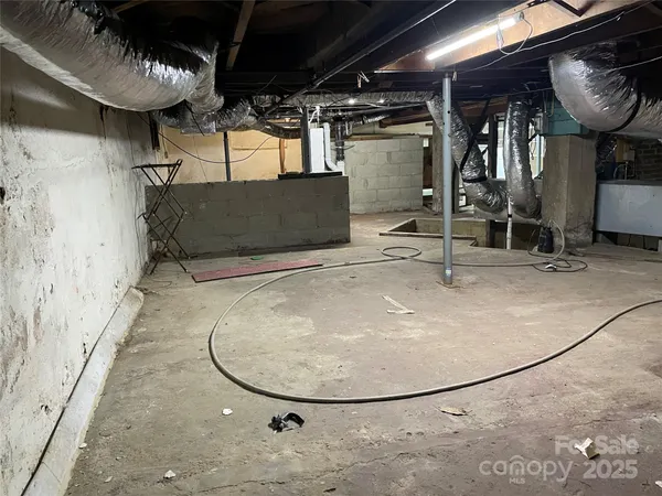 a view of a livingroom with wooden floor