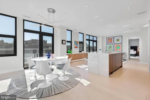a view of a dining room with furniture window and outside view