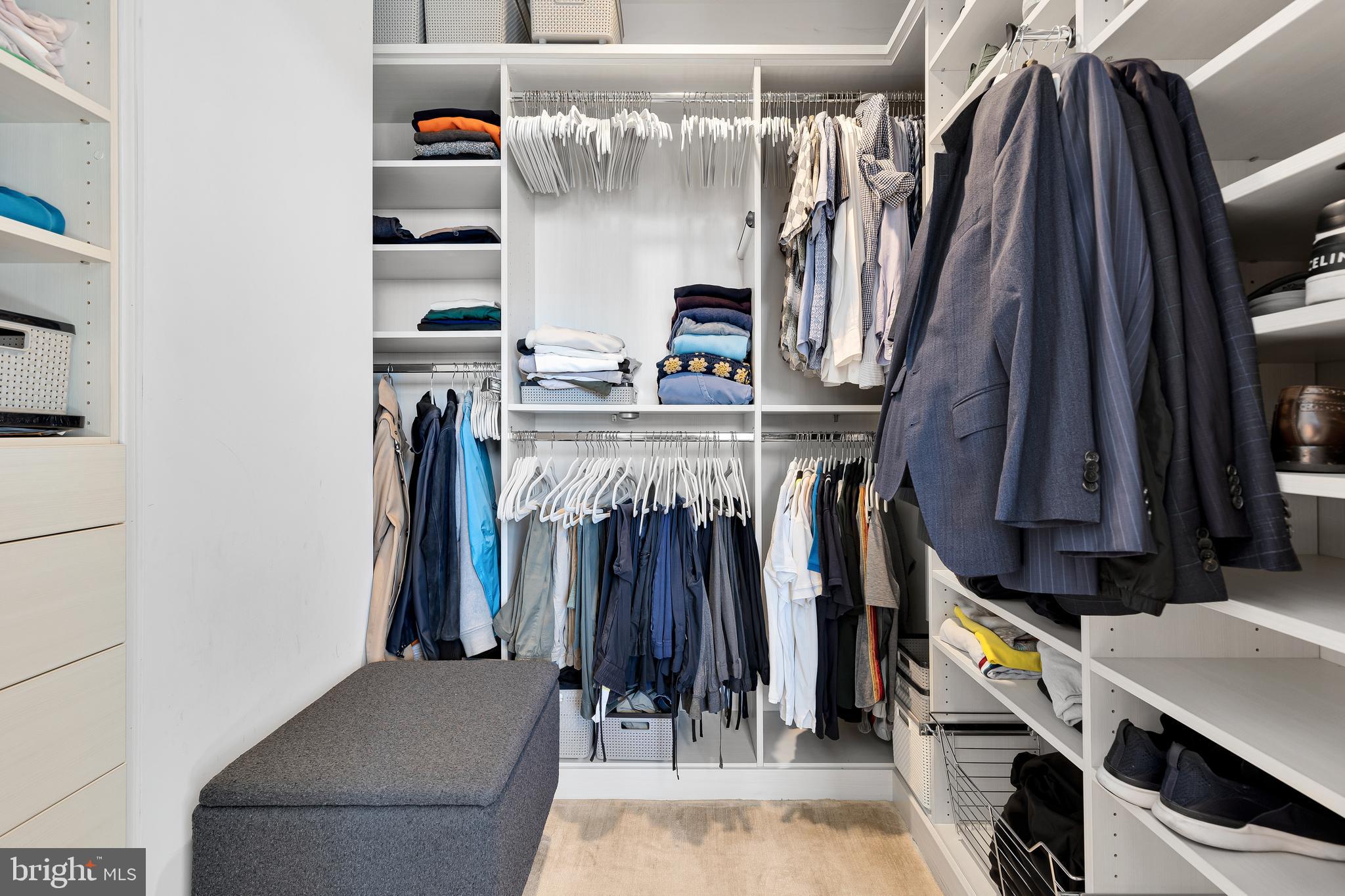 1427 Rhode Island Avenue Northwest, Unit PH01 Washington, DC 20005 - Photo 23 of 60 a view of walk in closet with clothes and shoes