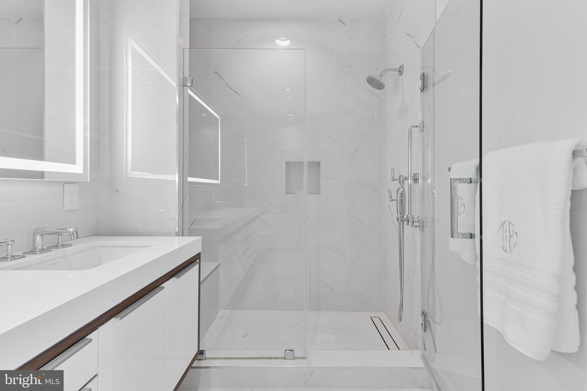1427 Rhode Island Avenue Northwest, Unit PH01 Washington, DC 20005 - Photo 25 of 60 a bathroom with a shower and a sink