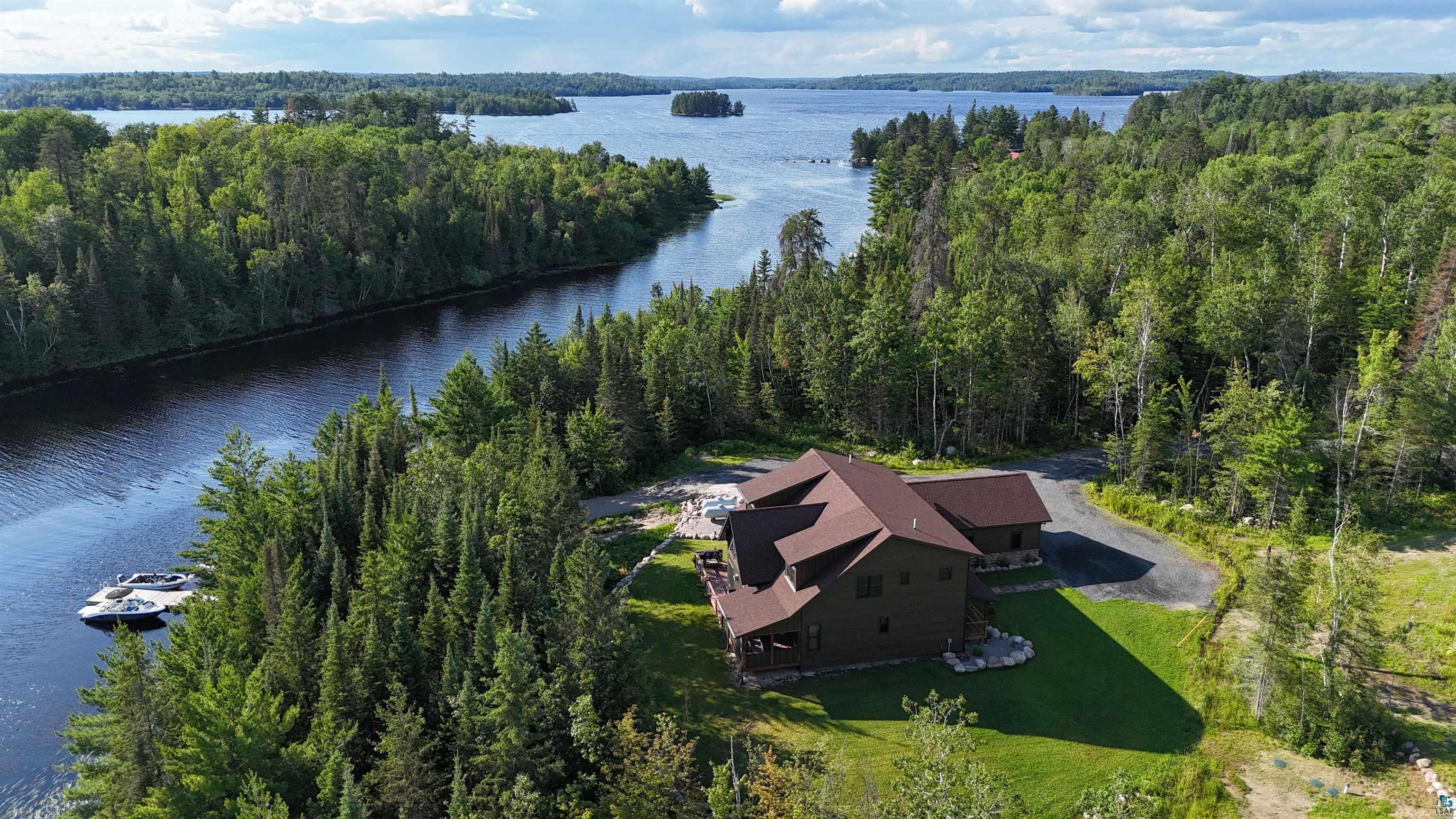 7523 Nelson Road Crane Lake, MN 55725 - Photo 1 of 51 Drone / aerial view featuring a water view and a view of trees
