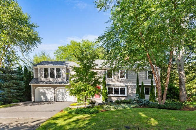 75 Cedar Street Lexington, MA 02421 - Photo 1 of 42 front view of a house with a yard