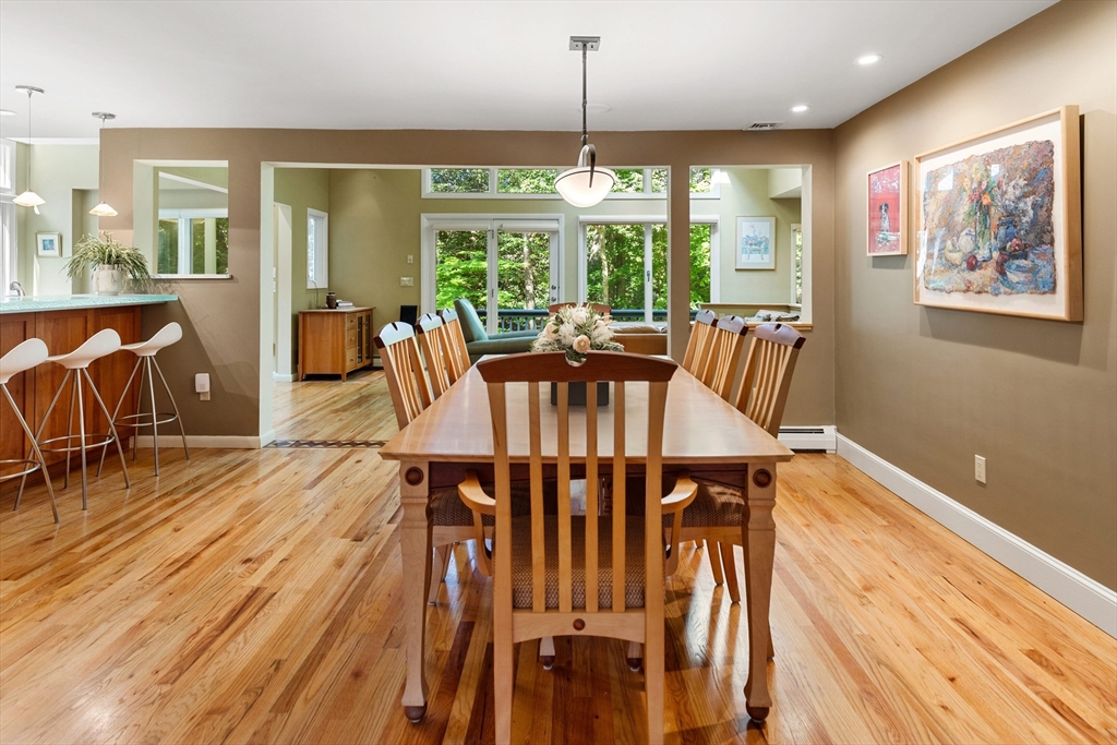 75 Cedar Street Lexington, MA 02421 - Photo 7 of 42 a view of a dining room with furniture window and wooden floor