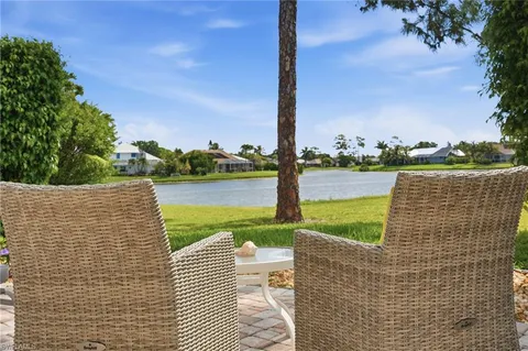 a view of a patio with a yard