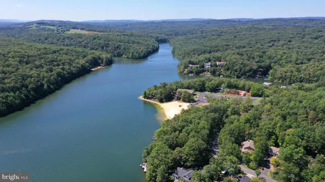 a view of a lake with mountains in the background