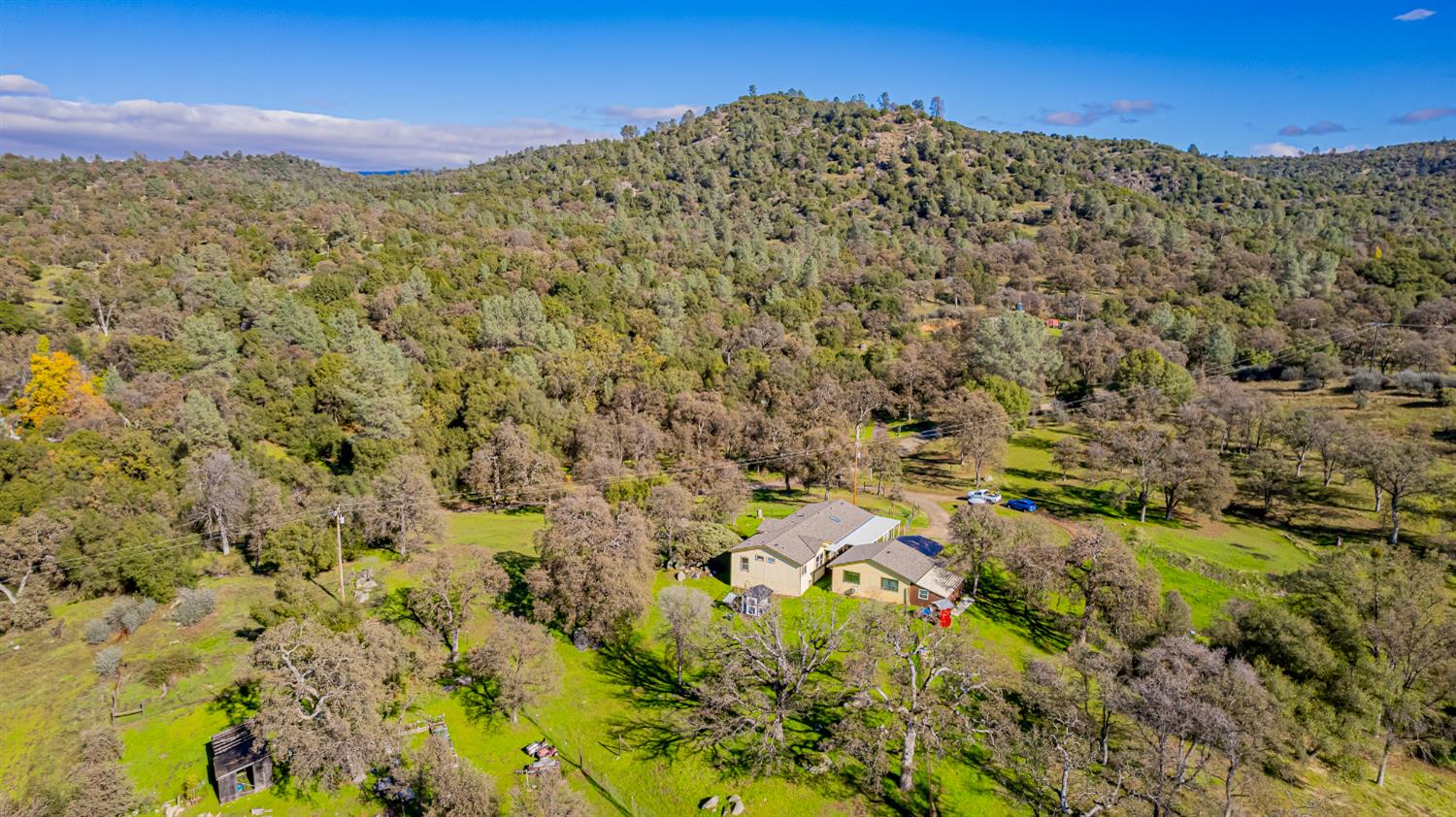3335 Wildcat Road Mariposa, CA 95338 - Photo 40 of 48 a view of a large building with mountains in the background