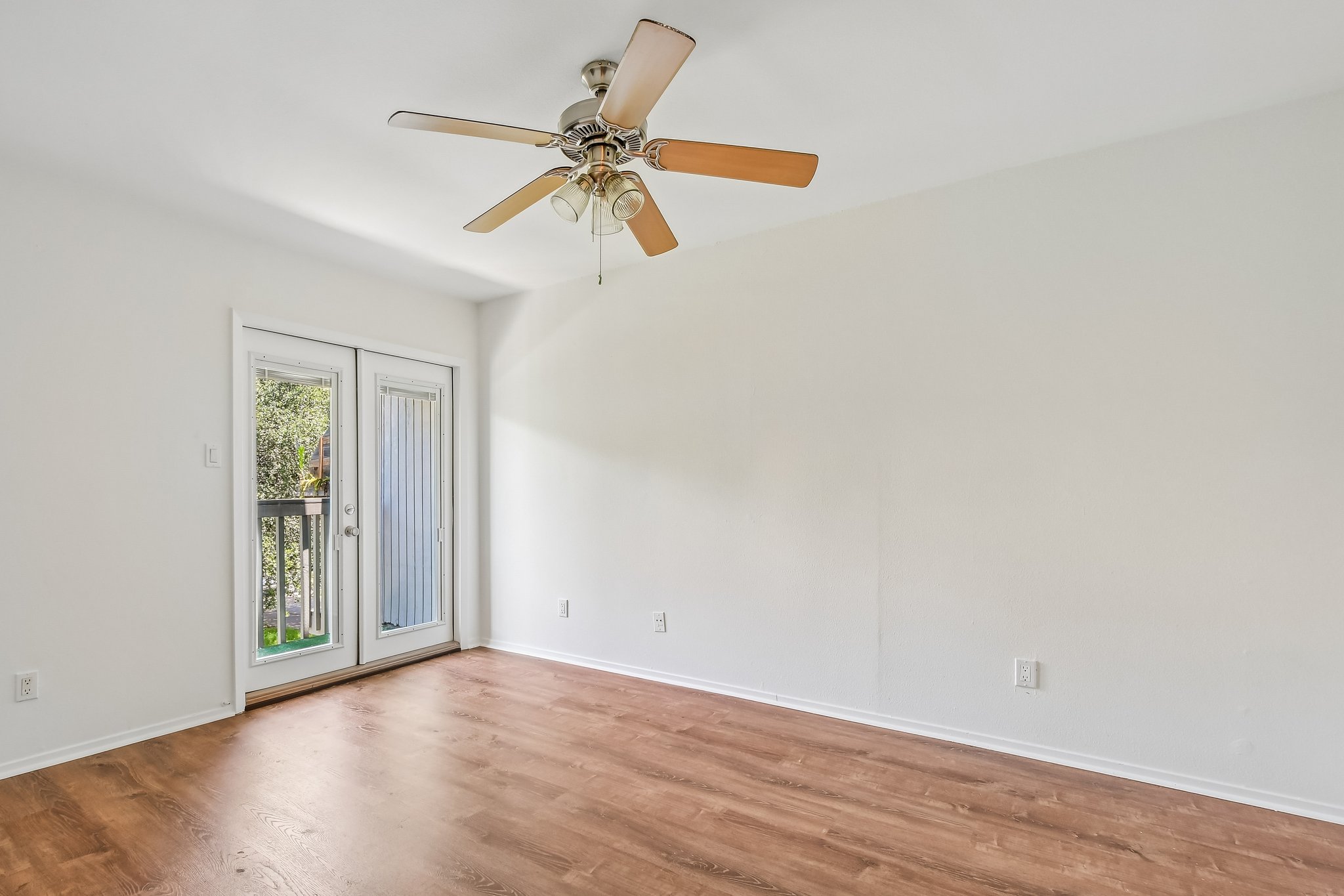 4202 Hudson Bend Road, Unit B Austin, TX 78734 - Photo 14 of 26 an empty room with wooden floor closet and windows