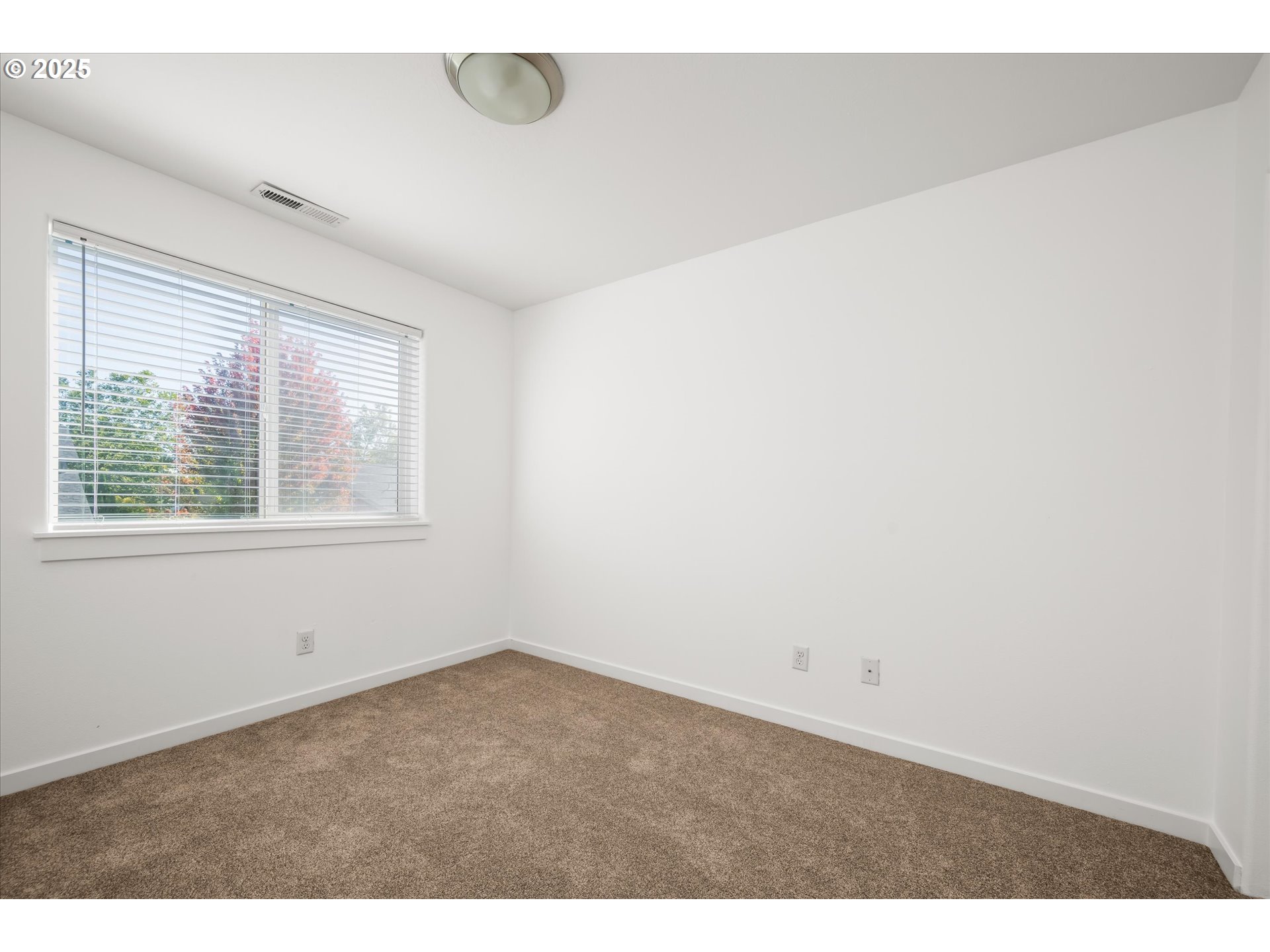 536 Raber Road Eugene, OR 97402 - Photo 26 of 41 a view of an empty room with a window