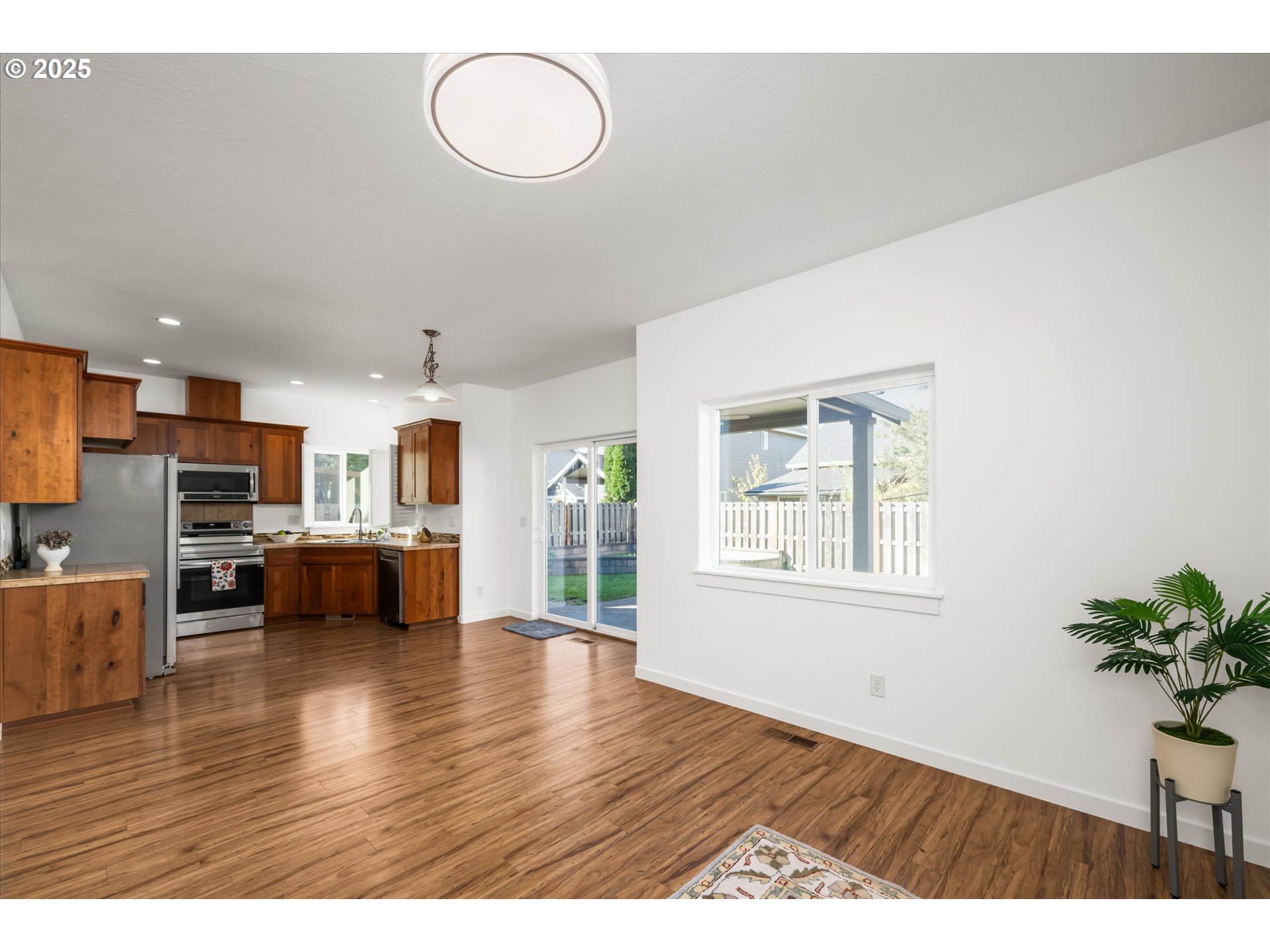 536 Raber Road Eugene, OR 97402 - Photo 8 of 41 a view of kitchen with furniture and wooden floor