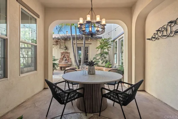 a kitchen with granite countertop a sink and cabinets