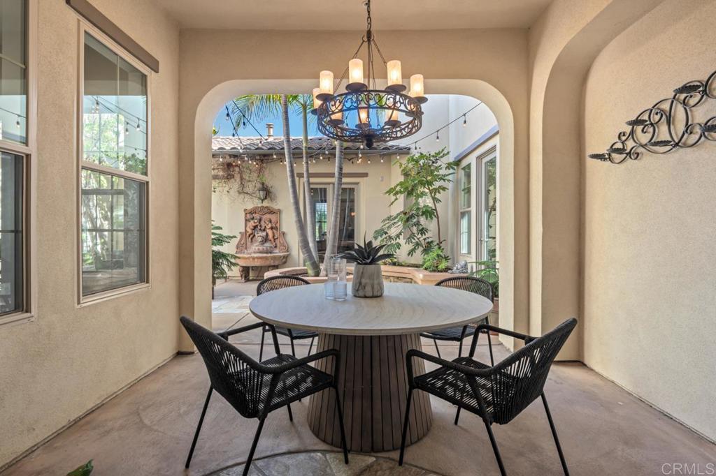 14844 Whispering Ridge Road San Diego, CA 92131 - Photo 14 of 73 a view of a dining room with furniture window and outside view