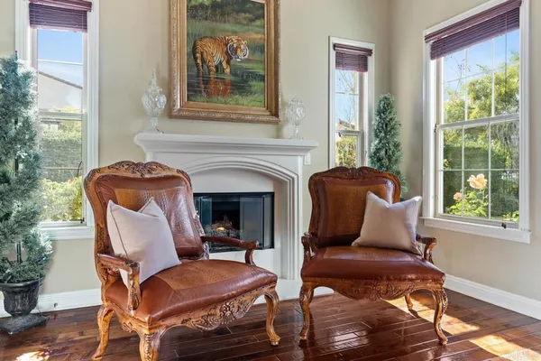 a dining room with furniture and window