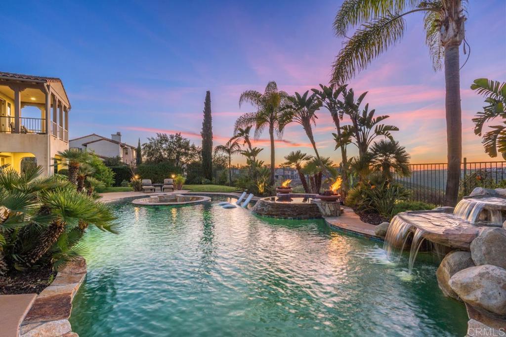 14844 Whispering Ridge Road San Diego, CA 92131 - Photo 2 of 73 a view of swimming pool with lawn chairs and a yard