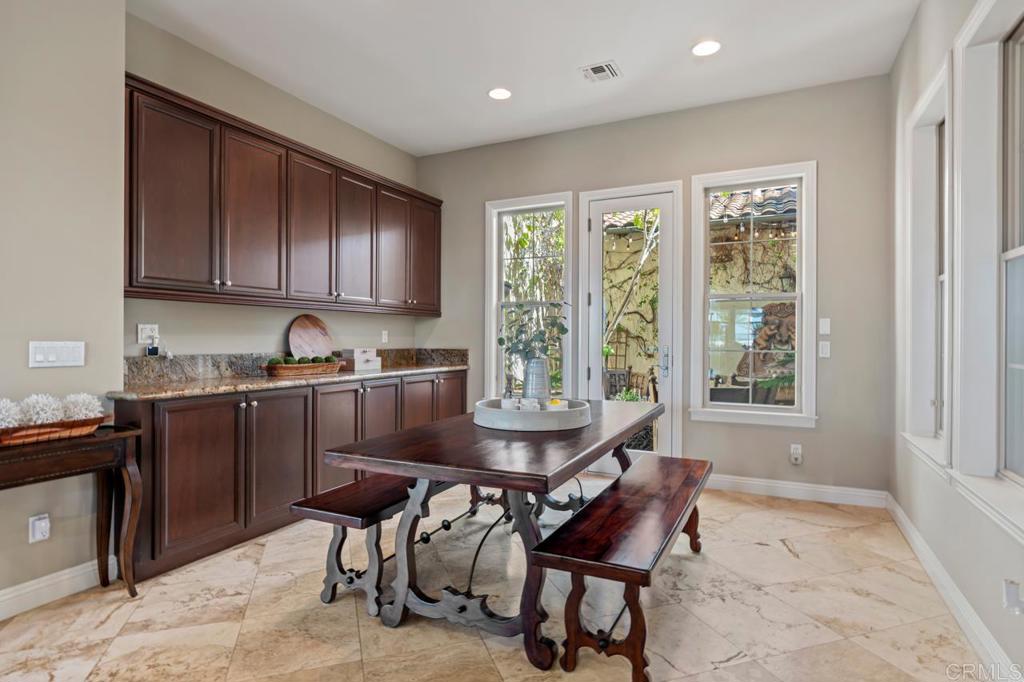 14844 Whispering Ridge Road San Diego, CA 92131 - Photo 27 of 73 a dining room with furniture and window