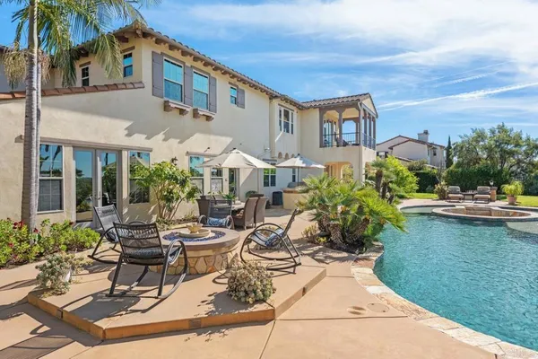 a view of a bathroom with a tub and shower