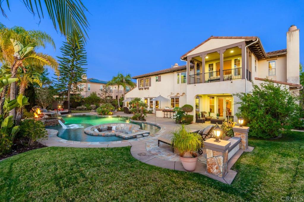 14844 Whispering Ridge Road San Diego, CA 92131 - Photo 43 of 73 a view of a house with backyard and sitting area