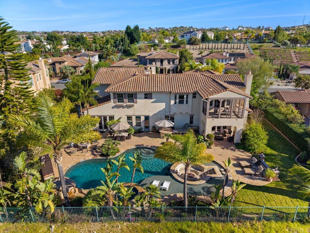 14844 Whispering Ridge Road San Diego, CA 92131 - Photo 45 of 73 an aerial view of a house with swimming pool and outdoor seating