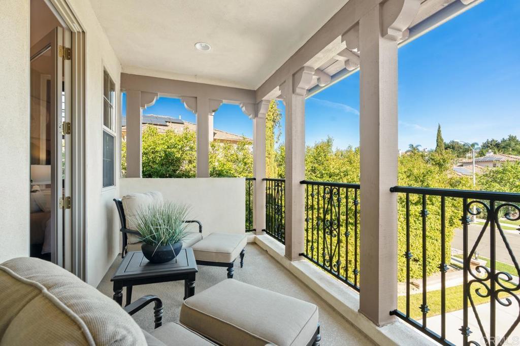 14844 Whispering Ridge Road San Diego, CA 92131 - Photo 64 of 73 a view of a porch with furniture and wooden floor