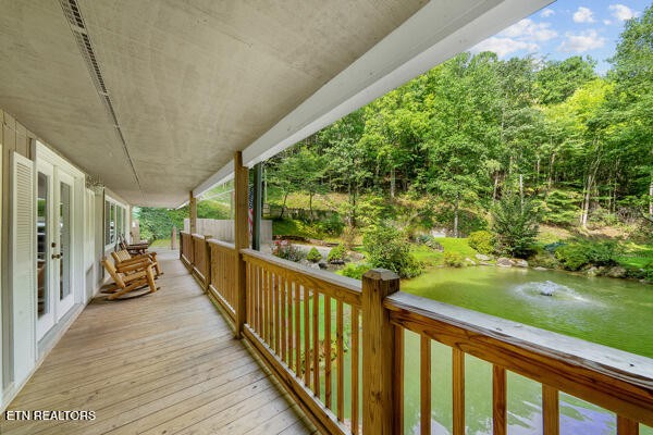 3127 Emerald Springs Loop Sevierville, TN 37862 - Photo 11 of 60 a view of a porch with wooden floor