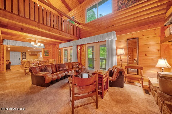 3127 Emerald Springs Loop Sevierville, TN 37862 - Photo 20 of 60 a living room with furniture a large window and a rug